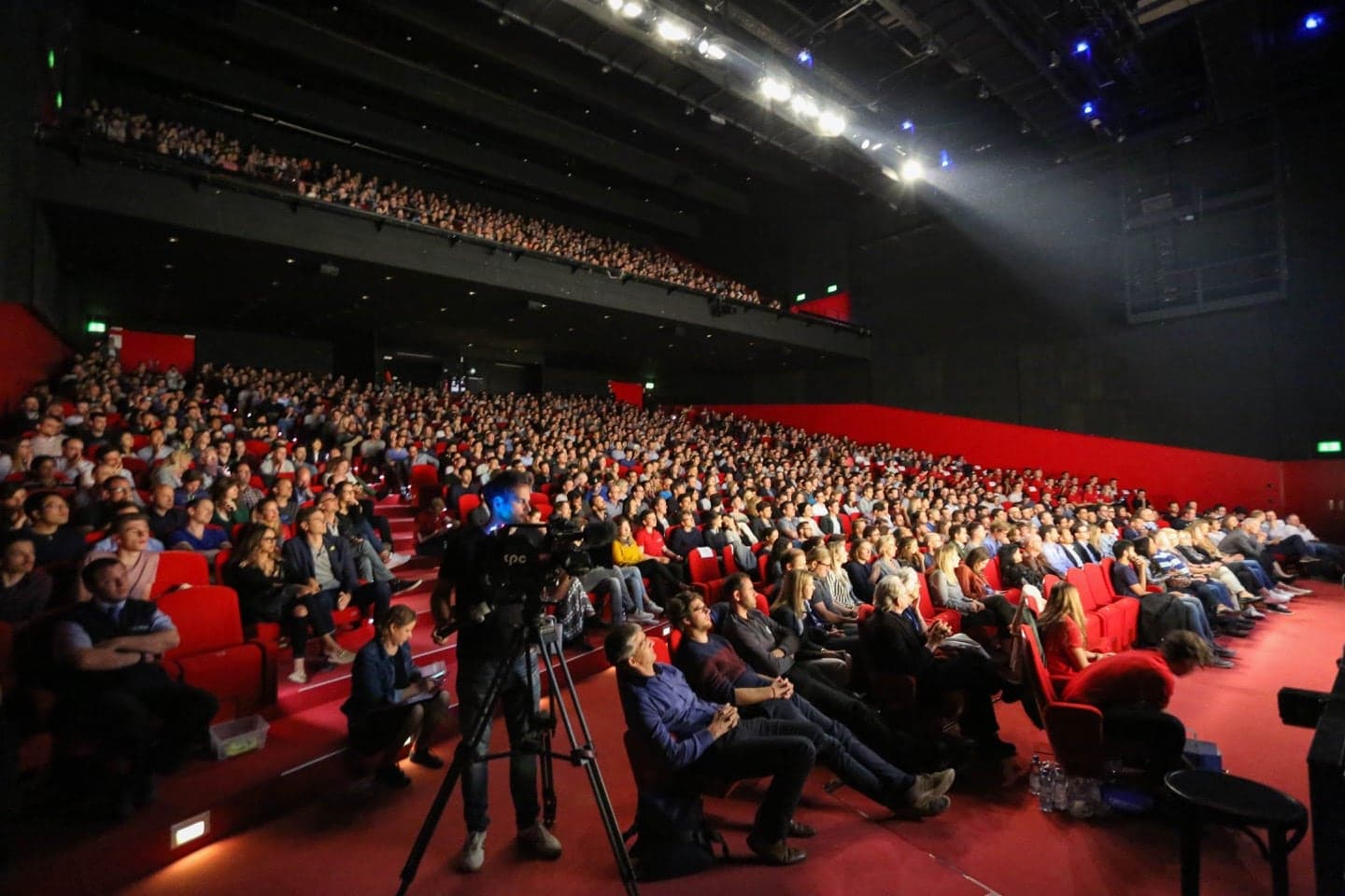 Speakers sharing candid failure stories on stage